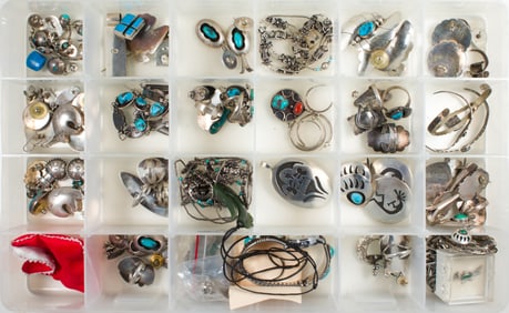 A box of Native American and southeast silver jewelry