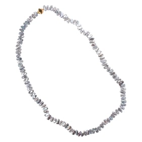 A colored freshwater keshi pearl and 14k gold necklace