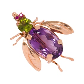 An amethyst, peridot and 14k gold brooch