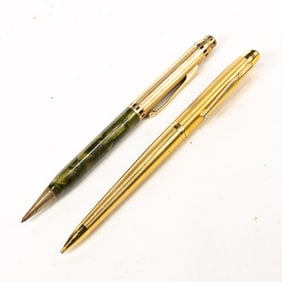 Two mechanical pencils including an Eversharp and a unmarked gilt pencil