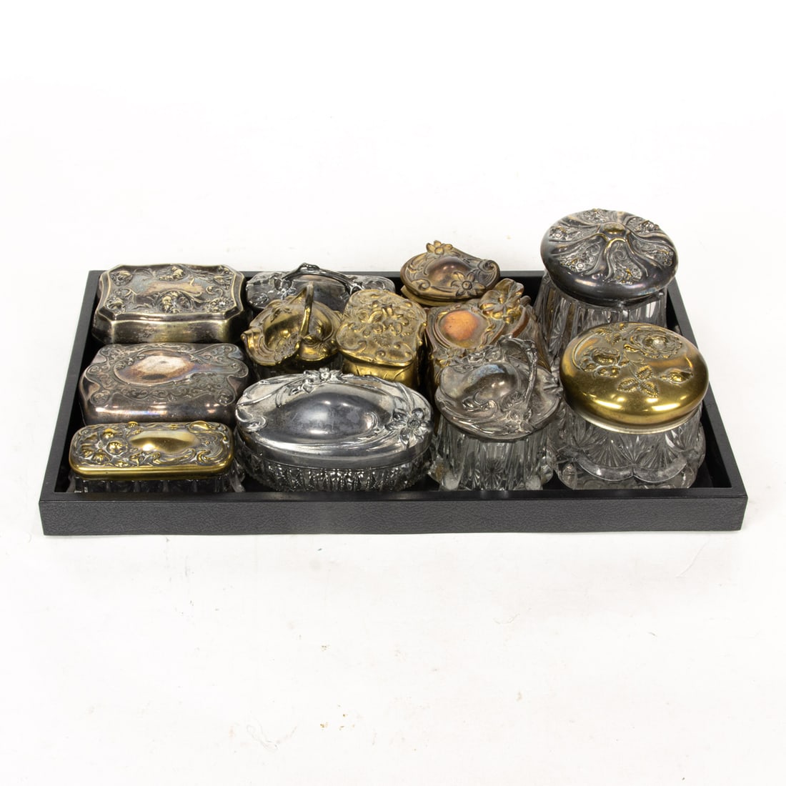 Twelve Art Nouveau silver plate and brass covered dresser boxes (1 of 1)