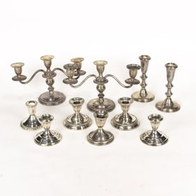 A lot of sterling silver weighted lighting, including Gorham