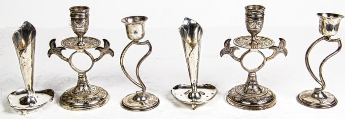 A pair of Taxco sterling silver candlesticks