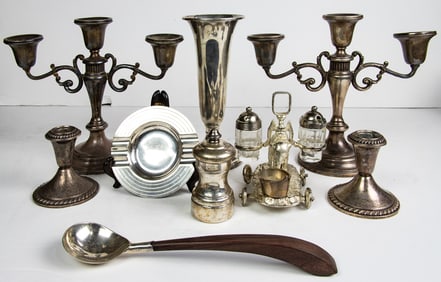 A lot of sterling weighted and sterling silver table articles
