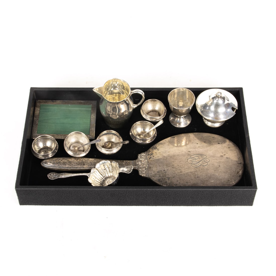 A lot of Gorham sterling open salts [5} and other sterling table articles, including a miniature: A lot of Gorham sterling open salts [5} and other sterling table articles, including a miniature Paul Revere bowl; a Gorham tea strainer, a Fisher creamer, an egg cup, a hand mirror 13"l and a picture