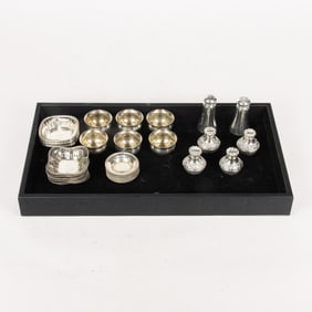 A lot of sterling nut dishes, open salts, and shakers