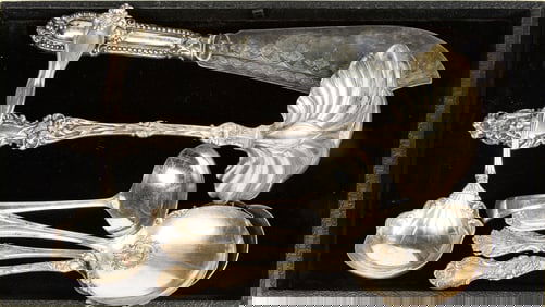 A Lot of Art Nouveau sterling and plated serving pieces, including a lily pattern punch ladle, a