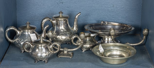 A lot of mostly quadruple plate teawares, a bride basket and a pair of Deco two-light candelabra