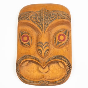 A New Zealand Maori polychrome carved wood mask