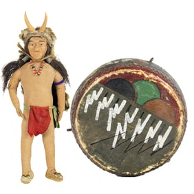 A Collection of Native American items: a Hopi drum, a doll, a Northwest Coast eagle and a tooth