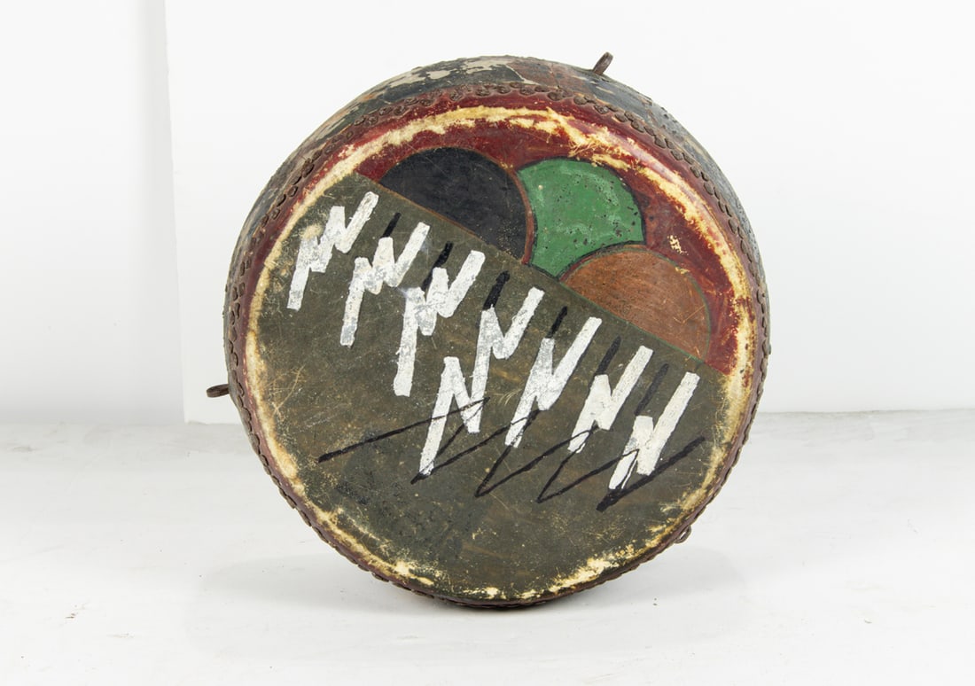 A Collection of Native American items: a Hopi drum, a doll, a Northwest Coast eagle and a tooth: A Hopi drum and doll; doll 13"x 5"x 2", drum h 5.25x d 10.5