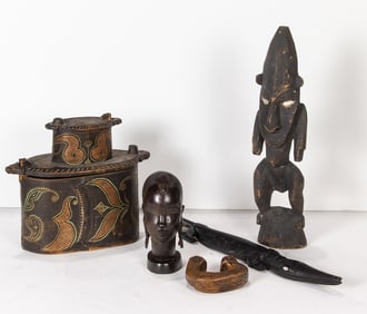 A lot of four African mostly carved wood artifacts
