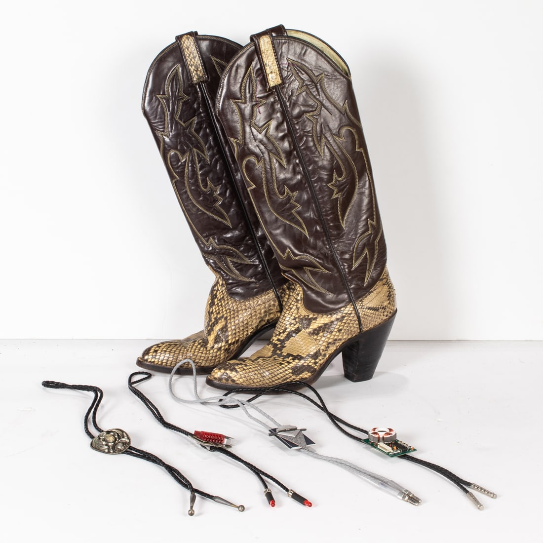 A lot of four light up bolo ties together with a pair of women's cowboy boots; h 18": A lot of four light up bolo ties together with a pair of women's cowboy boots; h 18"