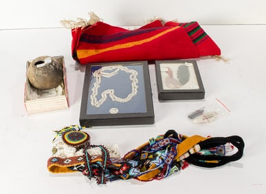 A lot of Native American artifacts, including Honokan necklace, arrowheads and a Late Mississippi