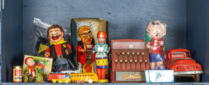 A lot of vintage toys including a battery operated Indian Joe with a war drum; a mechanical sheriff,