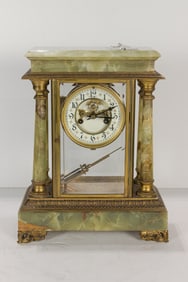 A French bronze mounted green onyx four glass mantel clock