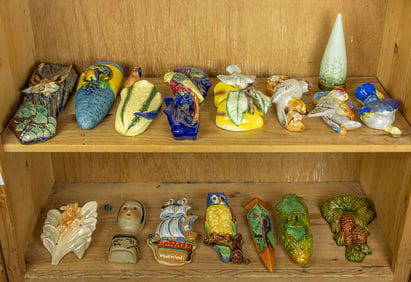 A group of sixteen mainly Japanese ceramic wall pockets