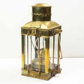 An English brass ship's lamp or cargo light