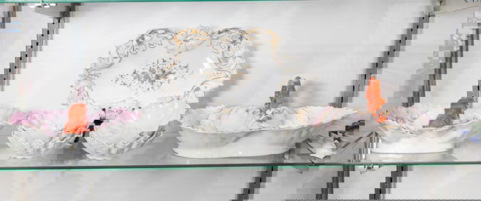 A group of German and French shell or lobster decorated porcelain, early 20th century