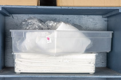 An Arts & Crafts linen table cloth after a design by Walter Crane and four others