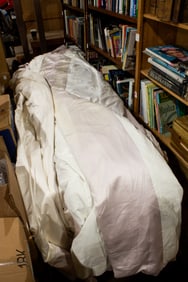 A group of ivory and rose pink silk curtains