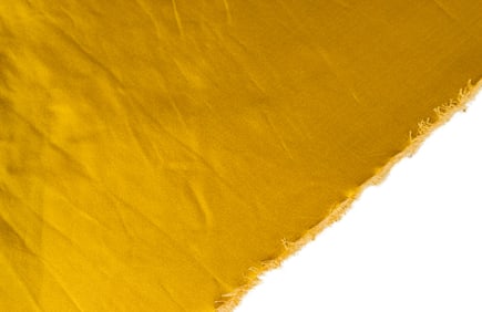 Three bolts of cotton fabric and a valance from a Parish-Hadley interior