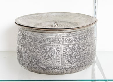 A Persian engraved tin copper bowl