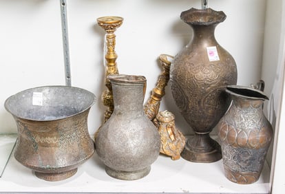 A group of Persian engraved copper vessels