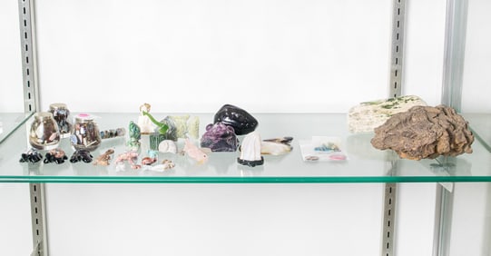 A group of specimen stones and carvings