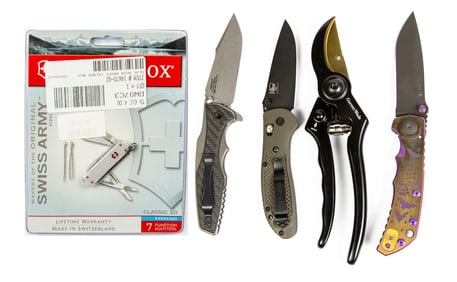 Five Contemporary outdoor, utility and sporting knives in original boxes, including Benchmade