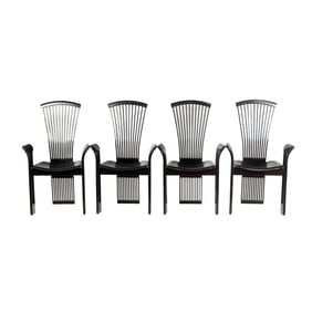 A set of four Italian Peiro Constantini dining chairs