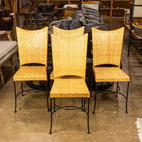A set of four Contemporary rattan and wrought iron chairs