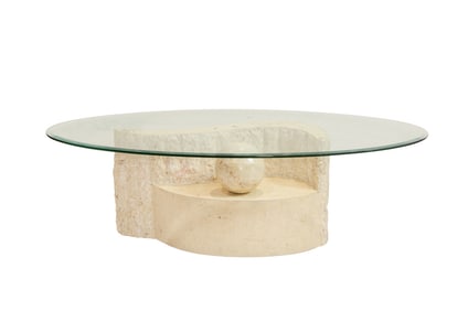 A Maitland Smith tessalated stone and glass top cocktail table
