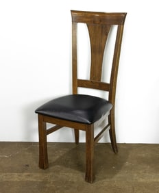 A Traditional style side chair with upholstered seat