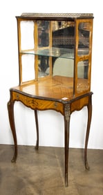 A petite Louis XV style bronze mounted marquetry inlaid etagere desk