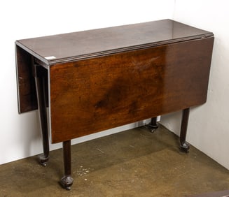 An English mahogany drop leaf table