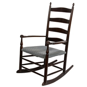 A Shaker style rocking chair with upholstered seat