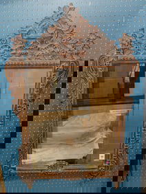 A French Provincial style mirror by Stephen Cavallo, New York, from a Mario Buatta designed interior