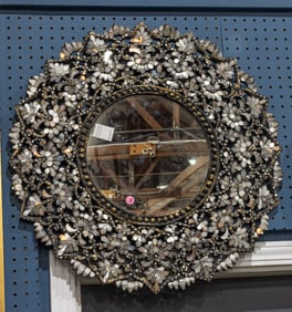 A Thai engraved glass round wall mirror