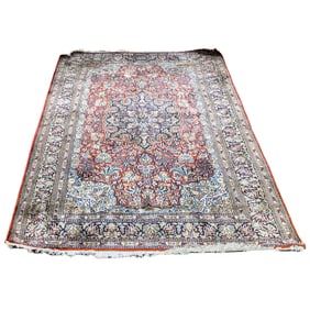 A Persian Kashan carpet