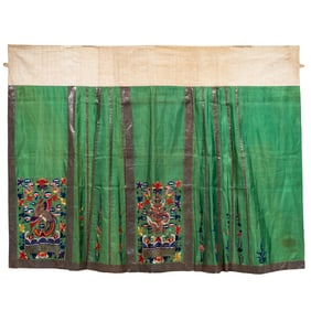 A Chinese green ground embroidered lady's skirt