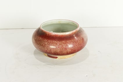 A Chinese peach bloom brush washer