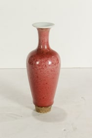 A Chinese peach bloom vase
