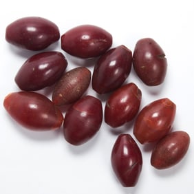 (lot of 12) Chinese archaic red glass beads