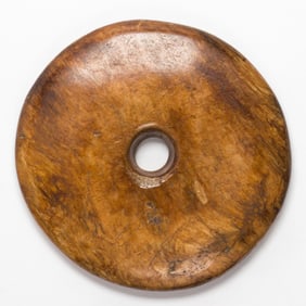 A Chinese archaic hardstone bi disc
