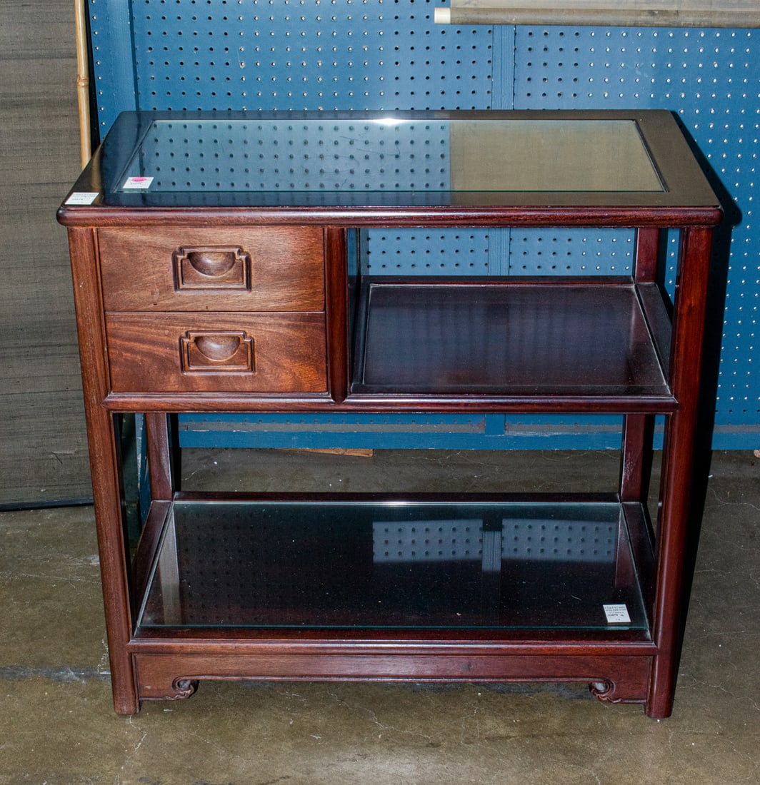 A Chinese hardwood table: A Chinese hardwood table. 30"h x 31.5"w x 18"d.