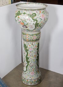 A Japanese enameled jardiniere and pedestal