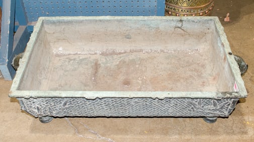 An Asian metal container