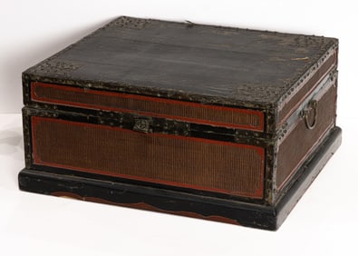 A vintage black and red lacquer box in the Asian taste