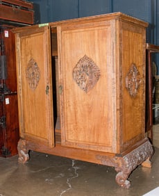 A Chinese wooden cabinet with stand